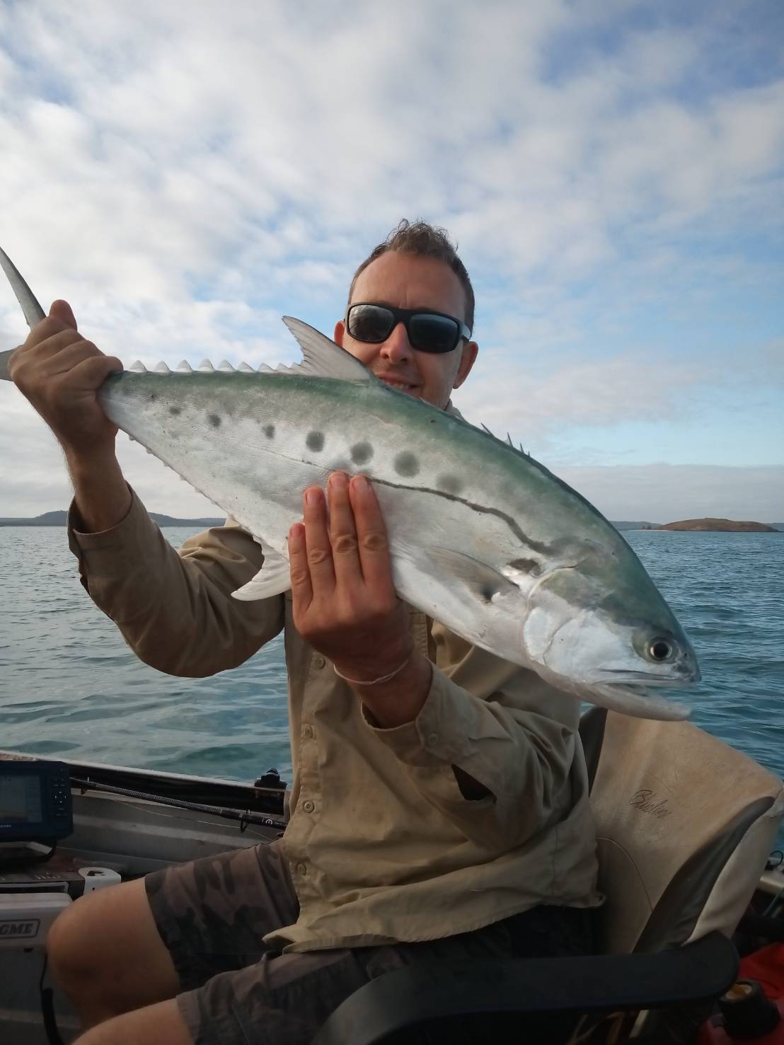 Longtail tuna held on a boat